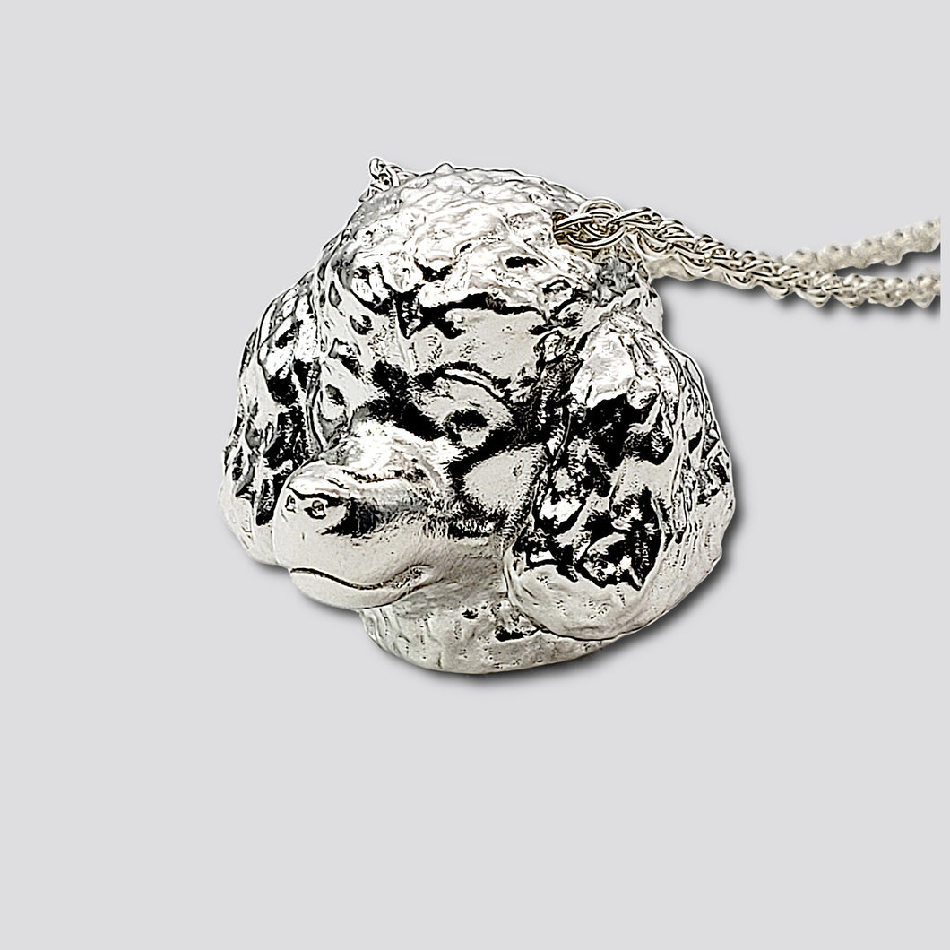 A sterling silver tribute to the Toy Poodle