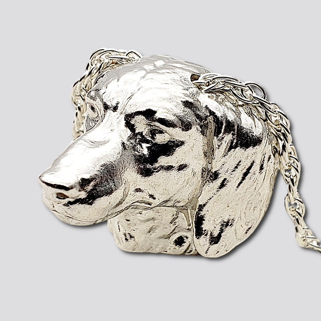 A sterling silver tribute to the  Long-Haired Dachshund