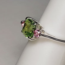 Load and play video in Gallery viewer, A sterling silver tribute to the Classic Three Stone Ring! Mint Green Tourmaline, Ascher Cut, 1.93 carat, and Pink Tourmaline, Brilliant Cut. October Birthstone
